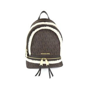 Michael Kors Brown Monogrammed Leather Shearling Trim Mini Backpack